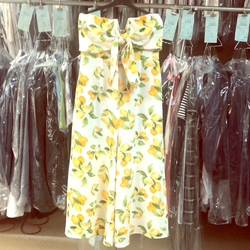 Strapless medium socialite wide leg romper.